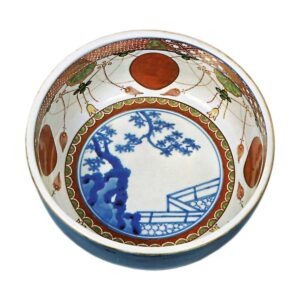 Bowl with red roundel design on inside, dark blue glaze on outside, enamelled ware