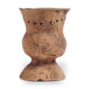 Haji ware: footed jar with perforated holes.