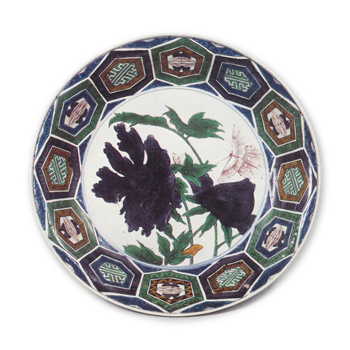 Large bowl with design of peonies and butterfly surrounded by linked hexagons, enamelled ware