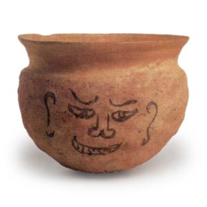 Haji ware: jar with ink drawing of human face.