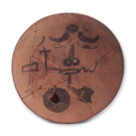 Haji ware dish with ink drawing of human face.