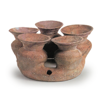 Sue ware: five clustered jars on ring foot.