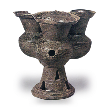 Sue ware: three clustered hasō on tall foot.