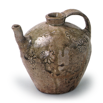 Seto ware: ewer with handle with stamped ornament, ash glaze.