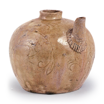 Seto ware: ewer with handle with incised ornament, ash glaze.