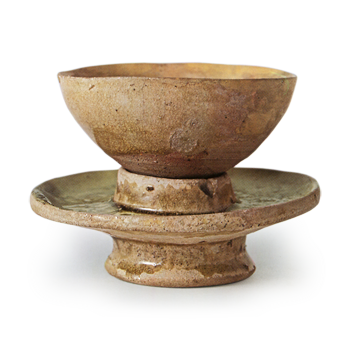 Seto ware: tea bowl and stand with stamped ornament, ash glaze.