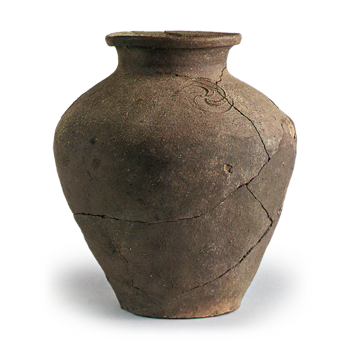 Tokoname ware: jar with tomoe crest design.