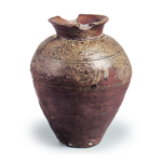 Jar with three horizontal grooves.