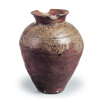 Jar with three horizontal grooves.