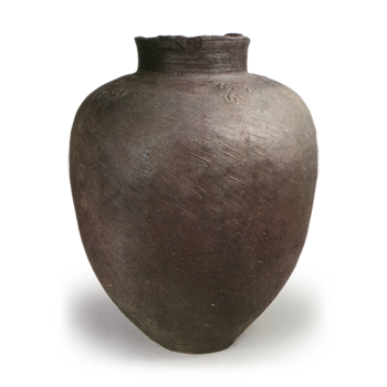 Suzu ware: jar with tomoe (circle composed of comma shapes) pattern.