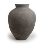 Suzu ware: jar with beaten surface.