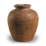 Bizen ware: beaked jar with wavy comb-mark incisions.