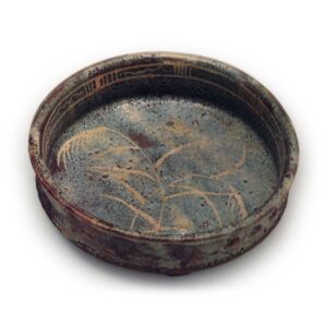 Gray shino mukōzuke bowl with row of bosses, with miscanthus design