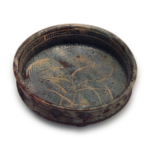 Gray shino mukōzuke bowl with row of bosses, with miscanthus design