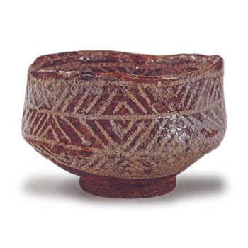 Gray Shino tea bowl with higaki pattern, known as "Sazanami"