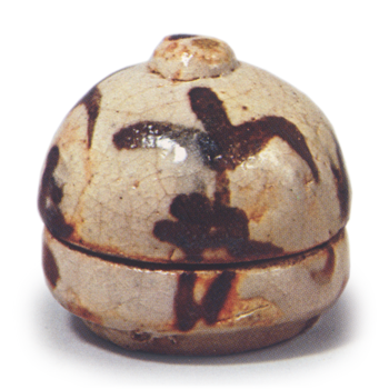 Shino incense caddy in orange shape