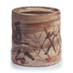 Marbled Shino water jar with two characters reading "Autumn Wind"