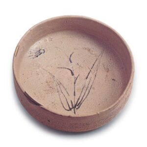 Shino bowl with flowering grass design