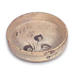 Shino bowl with flowering grass design