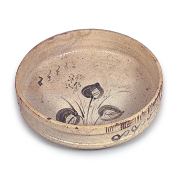Shino bowl with flowering grass design