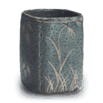 Gray Shino mukozuke bowl with flowering grass design