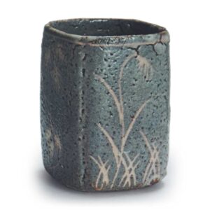 Gray Shino mukozuke bowl with flowering grass design
