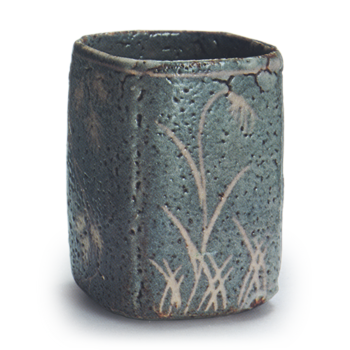 Gray Shino mukozuke bowl with flowering grass design