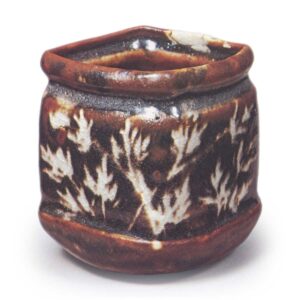 Gray Shino mukozuke bowl with flowering grass design