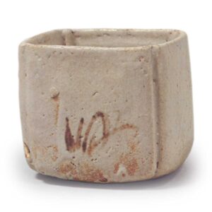 Shino mukōzuke bowl with flowering grass design