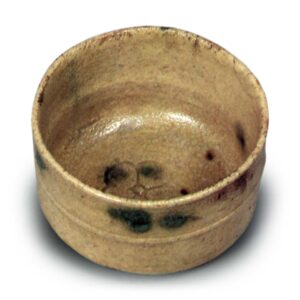 Yellow Seto tea bowl with dōhimo band, with plum blossom design