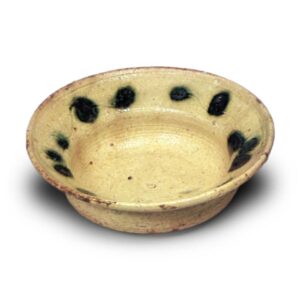 Yellow Seto bowl with plum scroll design