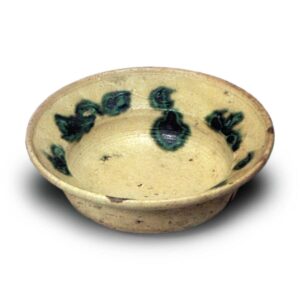 Yellow Seto bowl with plum scroll design