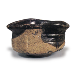 Black Oribe "shoe"-shaped tea bowl with reed and crane design