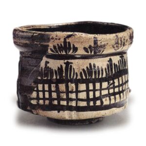 Black Oribe tea bowl with iris and checker design, known as "Masa-gaki"