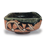 Oribe "shoe"-saped tea bowl with design of katawa-guruma (wheels in stream), known as "Yamaji"