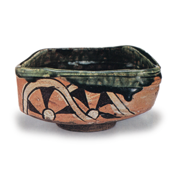 Oribe "shoe"-saped tea bowl with design of katawa-guruma (wheels in stream), known as "Yamaji"