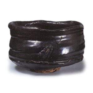 Oribe black (Oribe entirely covered with black glaze) "shoe"-shaped tea bowl