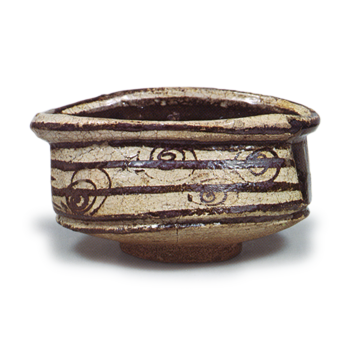 Black Oribe "shoe"-shaped tea bowl with spiral design