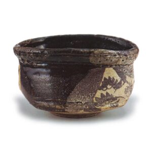 Black Oribe "shoe"-shaped tea bowl with pine-tree design, known as "Hagoromo"