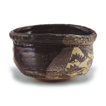Black Oribe "shoe"-shaped tea bowl with pine-tree design, known as "Hagoromo"