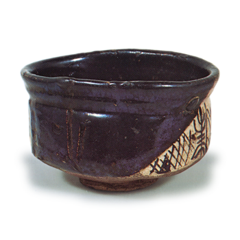 Black Oribe "shoe"-shaped tea bowl with geometric pattern known as higaki