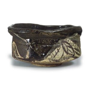 Black Oribe "shoe"-shaped tea bowl with leaf design