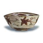 Oribe "shoe"-shaped tea bowl with flowering grass scroll design