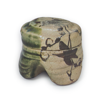 Oribe incense caddy with scrolling grass design