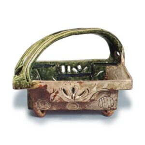 Oribe square bowl with handle across mouth with openwork design