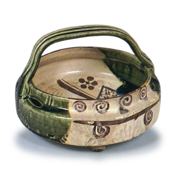 Oribe bowl with handle across mouth with openwork design