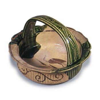 Oribe bowl with handle across mouth with reed and heron design