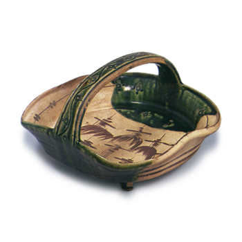 Oribe bowl with handle across mouth with landscape design