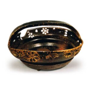 Bizen bowl with handle across mouth. with openwork design