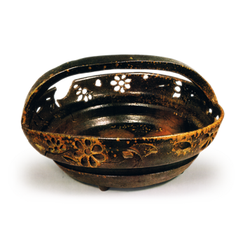 Bizen bowl with handle across mouth. with openwork design